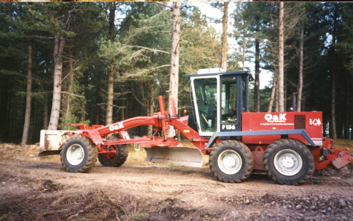 O & K F516 Grader working on roads