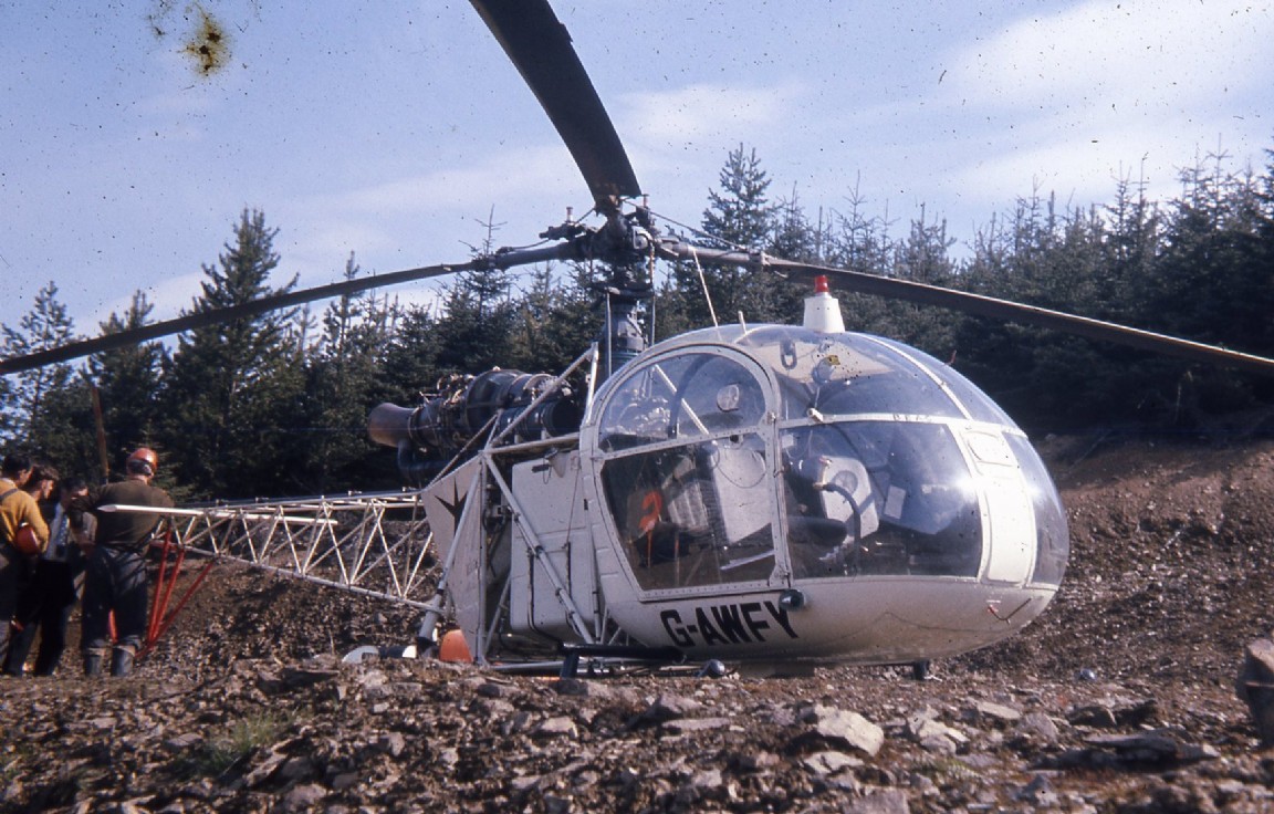 Aerial Fert in Clashindarroch Helicopter G-AWFY