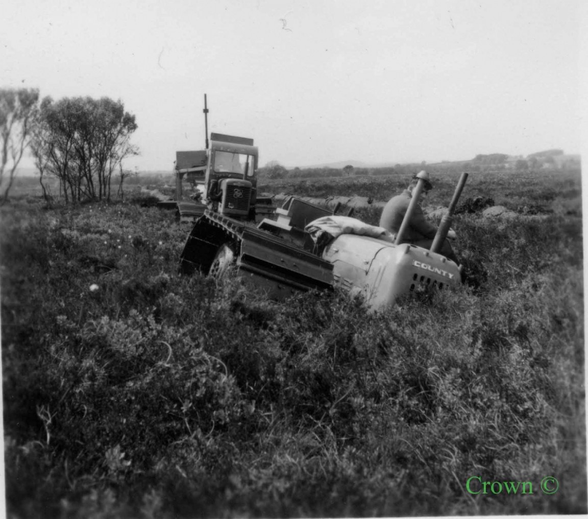 Short Wide County tractor bogged 