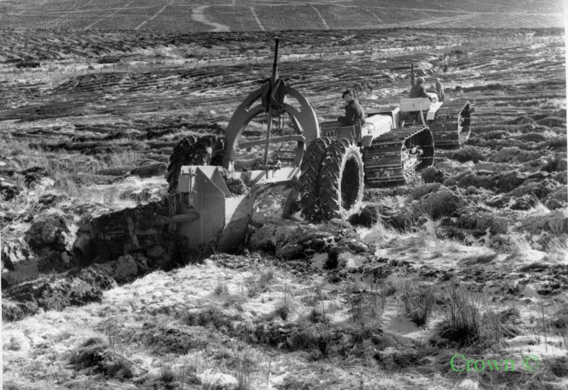 Draining team at work in Glenbreck Forest