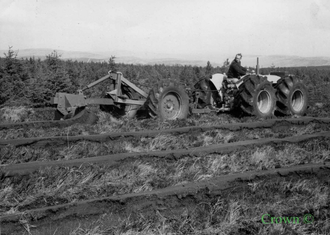 Ploughing with Wheeled tractor at Redesdale