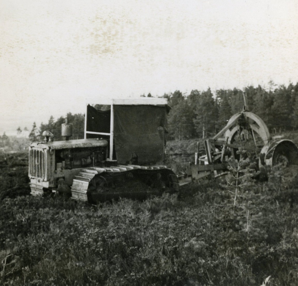 Caterpillar tractor and early Cuthbertson plough