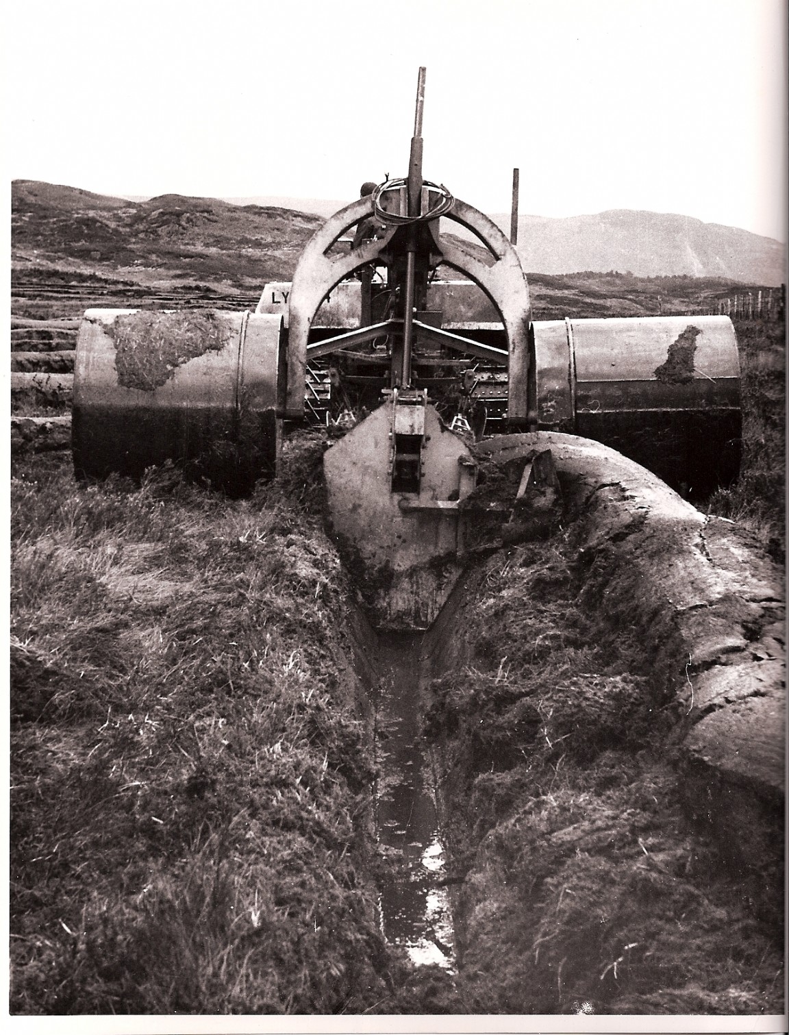Cuthbertson Water Buffalo pulling a draining plough