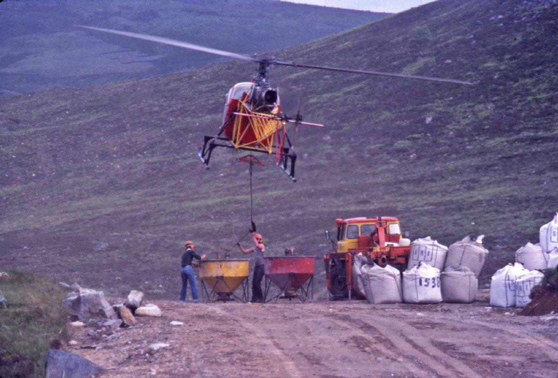 Aerial application of unground rock phosphate. 