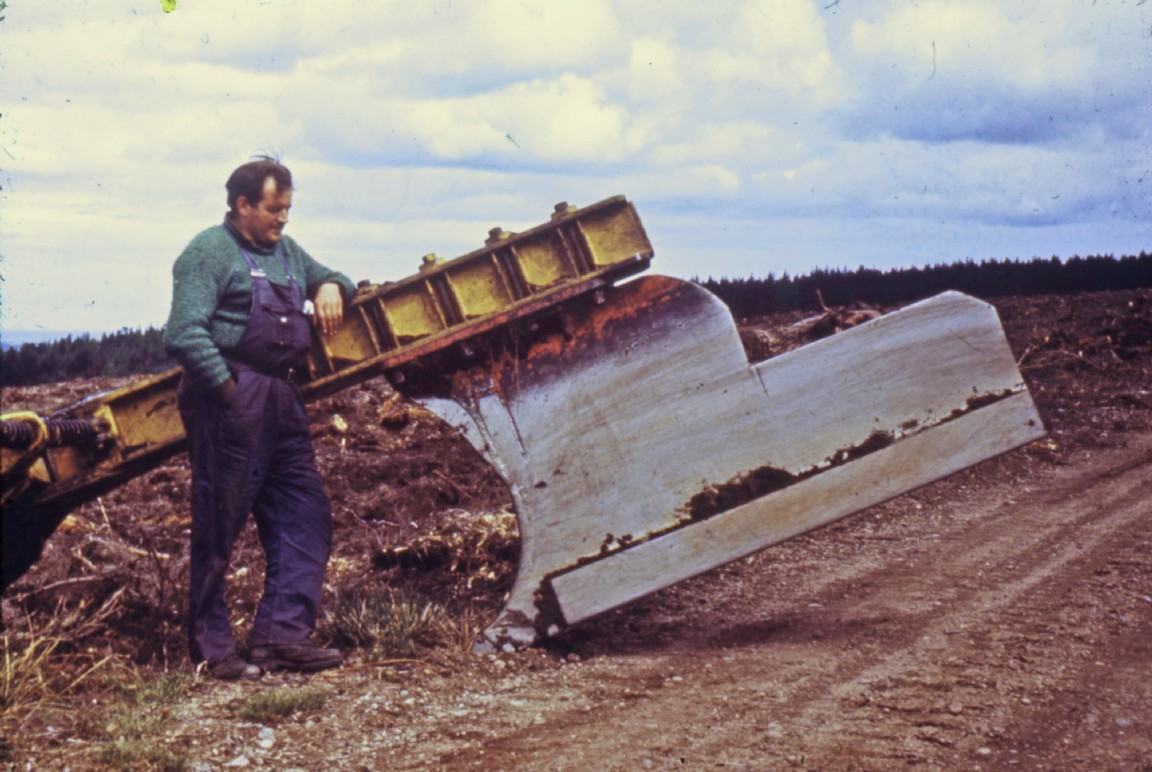 Dod Irvine with the business end of large single furrow mounted tine plough