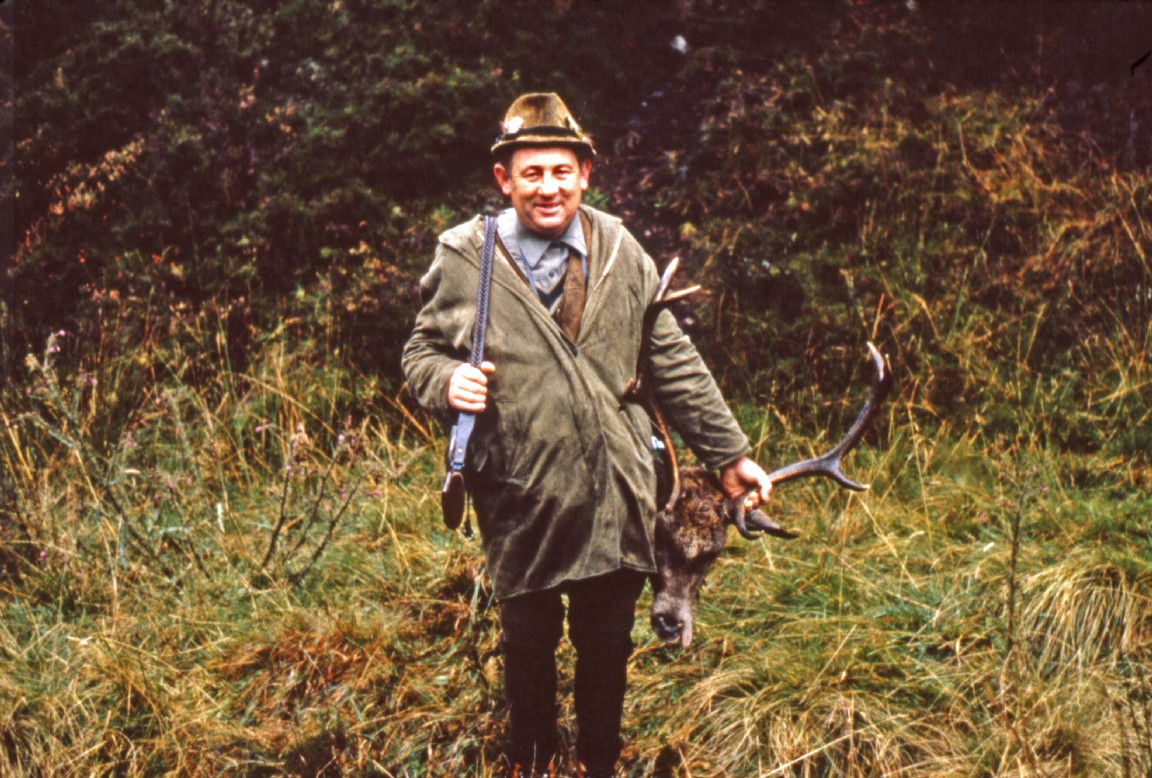 Forestry Keeper with red deer head and antlers