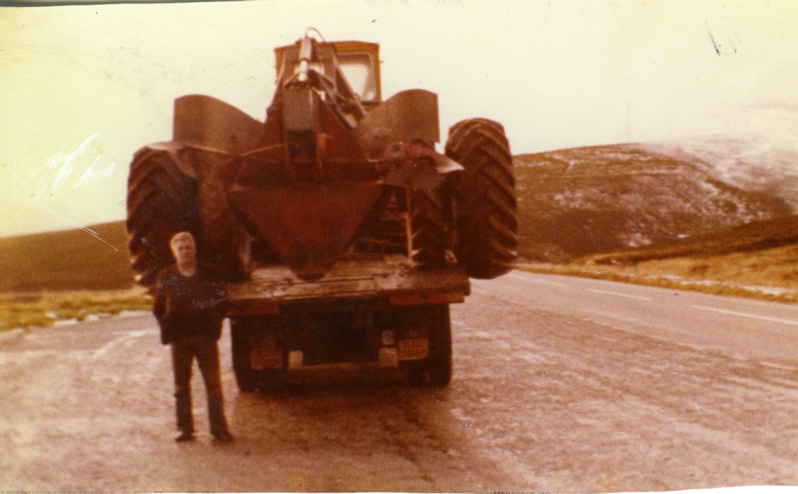 Donnie Junor ploughing tractor driver with his plough circa 1985 