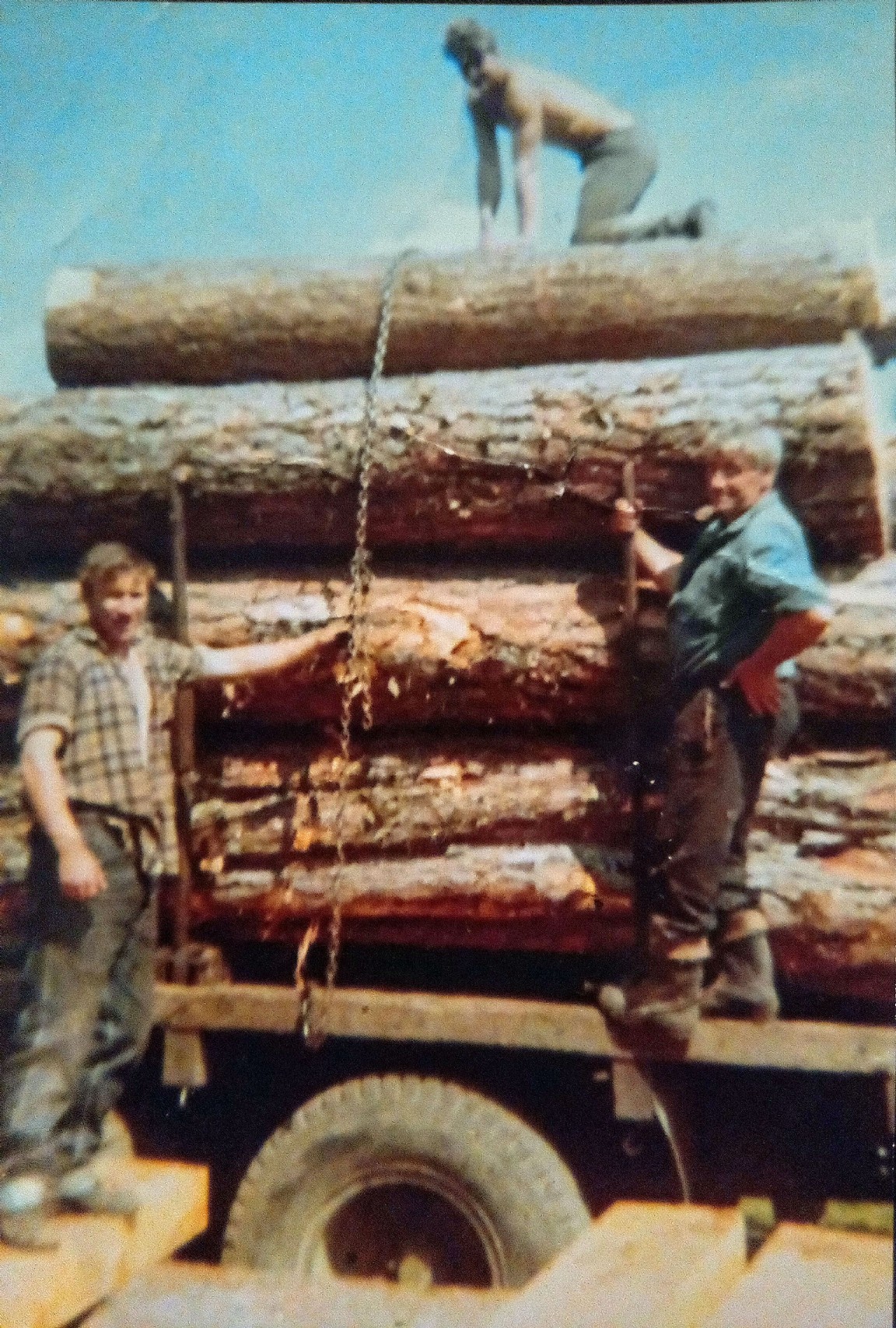Jock Nicolson helping to unload logs at Carrbridge sawmill circa 1965